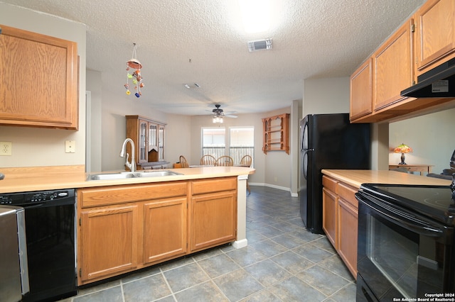 kitchen with kitchen peninsula, sink, black appliances, a textured ceiling, and ceiling fan