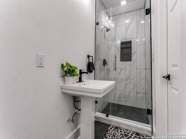 bathroom with an enclosed shower