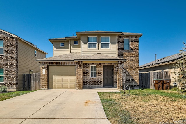 view of front of home with driveway, an attached garage, fence, brick siding, and a front lawn