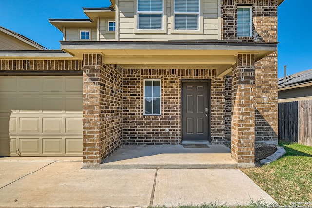 property entrance featuring a garage