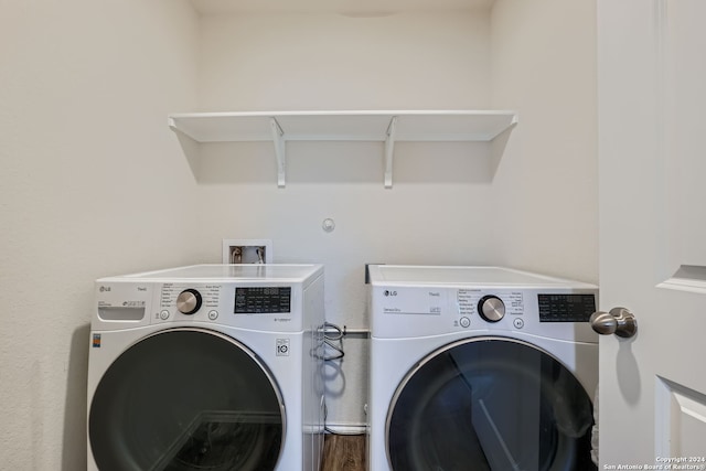 laundry area featuring washing machine and dryer