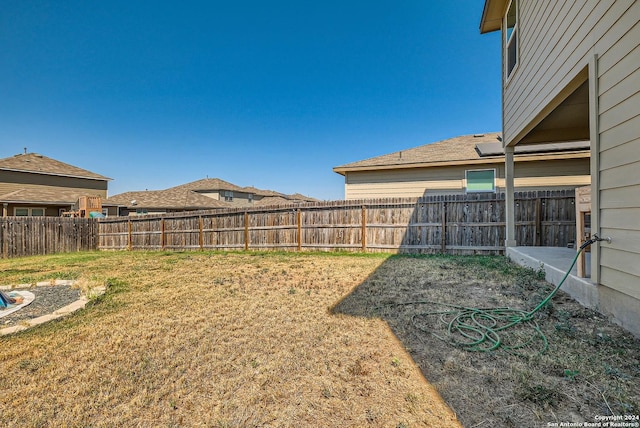 view of yard featuring a fenced backyard