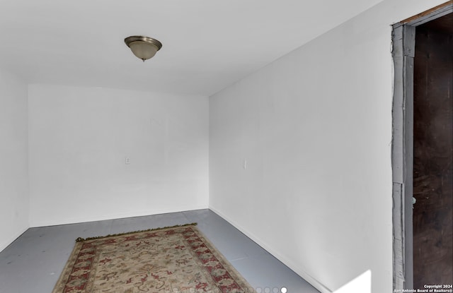 1627 Montezuma St, San Antonio, TX 78207 - spare room featuring concrete flooring