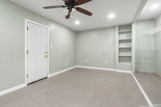 spare room featuring ceiling fan