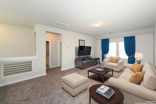 living room with light colored carpet