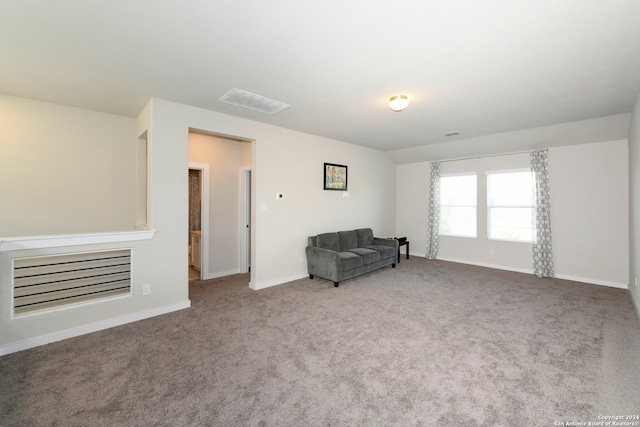 unfurnished room featuring carpet