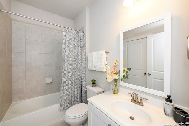 full bathroom with vanity, toilet, and shower / tub combo