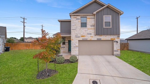 view of front of house featuring a garage and a front lawn