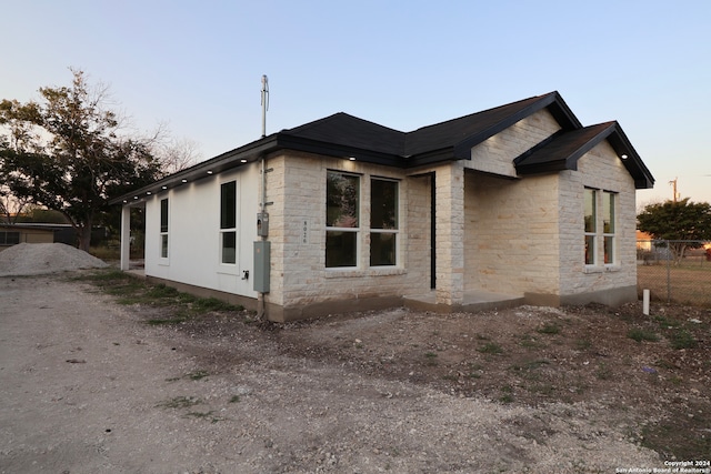 view of property exterior at dusk