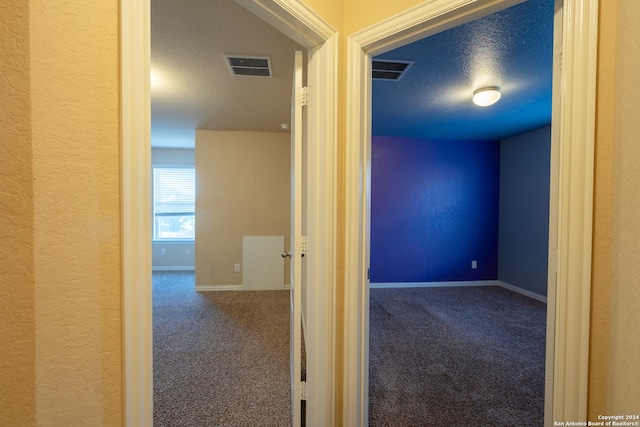 7527 Presidio Hvn, Boerne, TX 78015 - corridor featuring carpet, visible vents, and baseboards