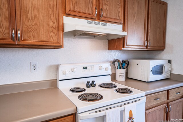 kitchen featuring white appliances