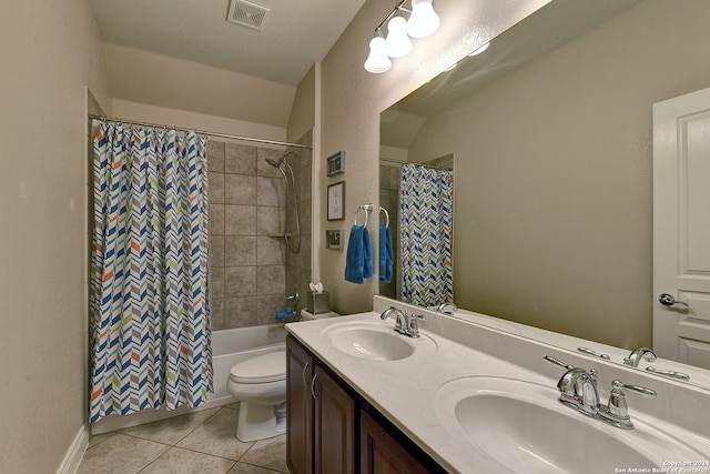 full bathroom with vanity, toilet, tile patterned flooring, and shower / tub combo with curtain