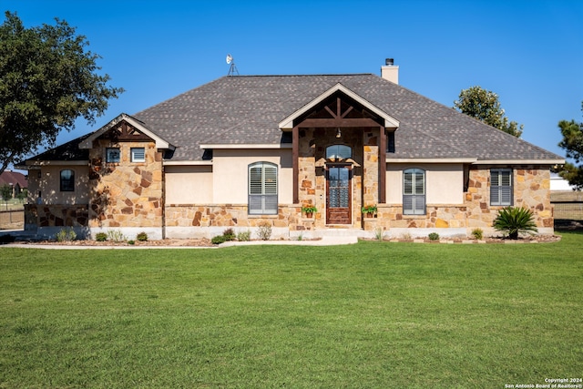 view of front of property with a front lawn