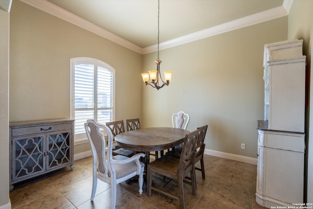 dining room featuring a notable chandelier and ornamental molding