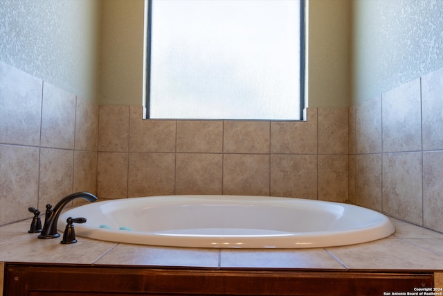 bathroom with a washtub