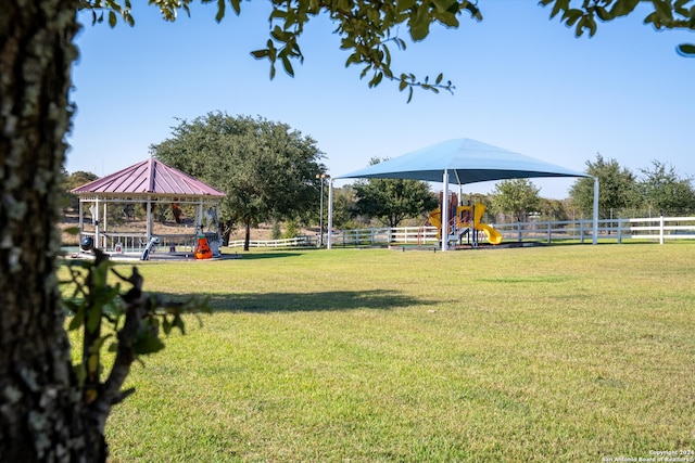 view of yard with a gazebo and a playground