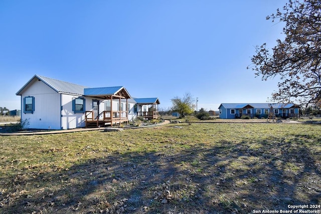 view of yard featuring a deck