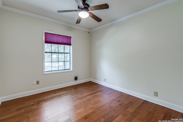 unfurnished room with ornamental molding, hardwood / wood-style flooring, and ceiling fan