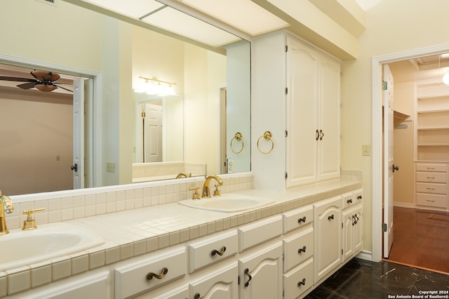 bathroom with vanity, ceiling fan, and hardwood / wood-style floors