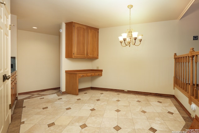 unfurnished dining area featuring a chandelier and light tile patterned flooring