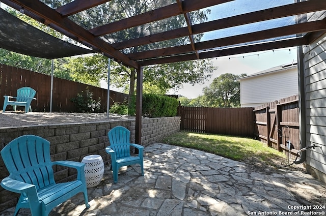 view of patio / terrace featuring a pergola