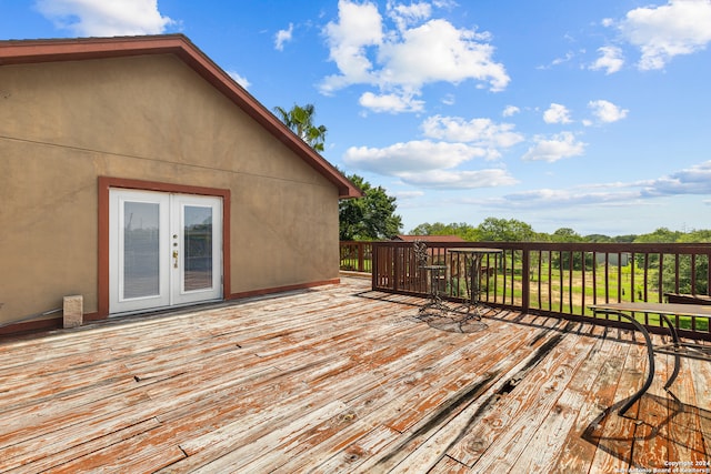 wooden terrace featuring french doors