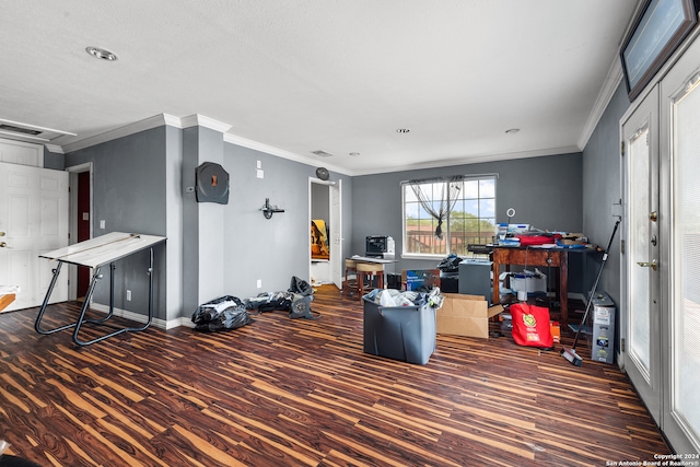 miscellaneous room featuring ornamental molding and dark hardwood / wood-style floors