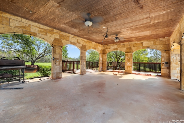 view of patio with grilling area and ceiling fan