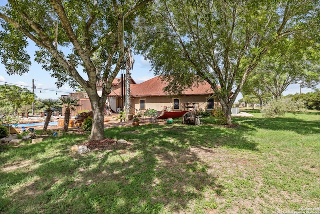 view of yard with a wooden deck