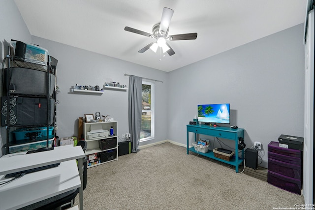 office area with carpet and ceiling fan