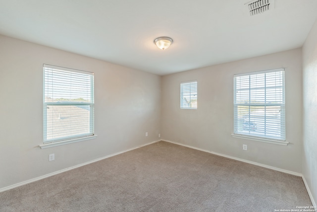 view of carpeted spare room