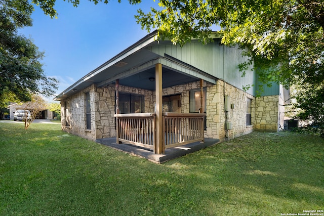 view of home's exterior featuring a lawn