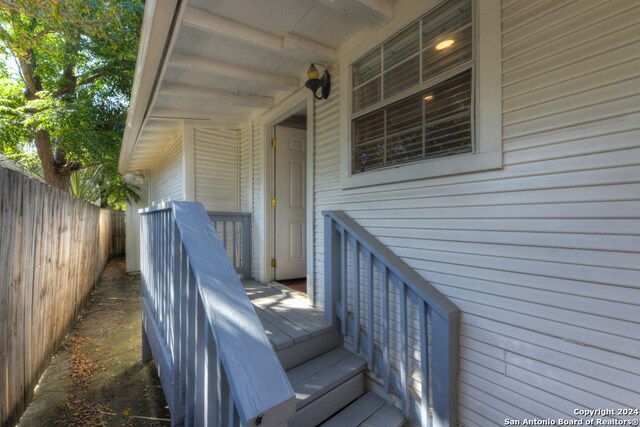 property entrance with a wooden deck