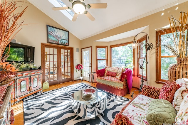 living room featuring french doors, ceiling fan, ornamental molding, and hardwood / wood-style floors