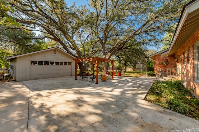 exterior space with an outdoor structure and a garage