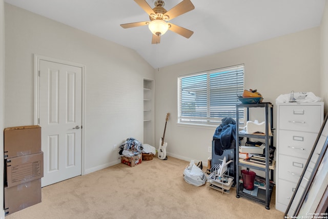 miscellaneous room with lofted ceiling, light colored carpet, and ceiling fan