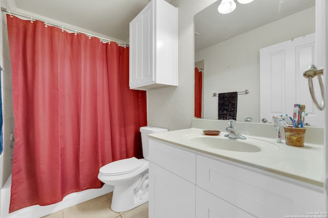 full bathroom with vanity, shower / bath combo, toilet, and tile patterned flooring