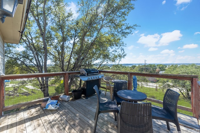 wooden terrace with grilling area