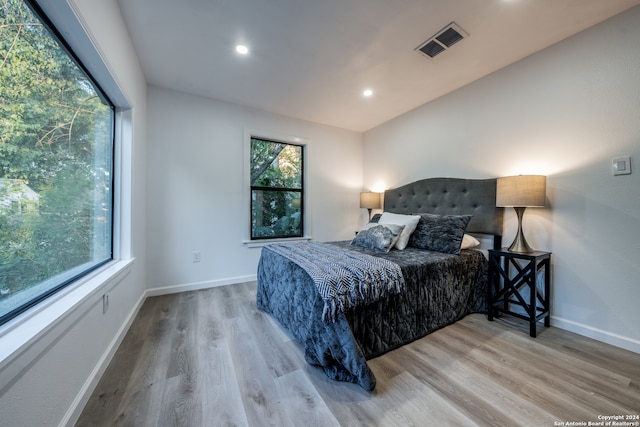 bedroom featuring hardwood / wood-style floors