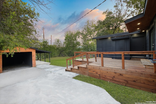 exterior space featuring a yard, an outbuilding, and a garage