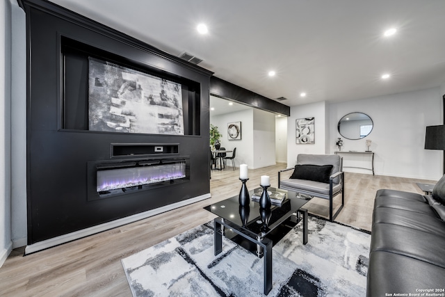 living room with light hardwood / wood-style floors