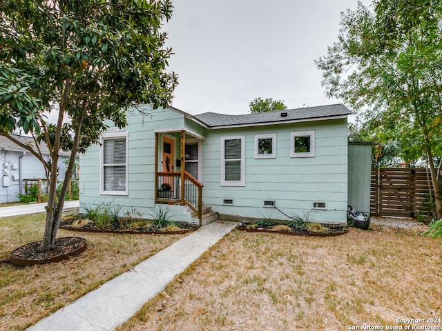 view of front of home with a front yard