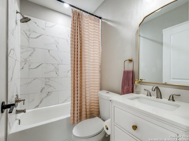 full bathroom with vanity, toilet, and shower / bath combo