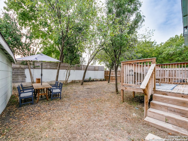 view of yard featuring a deck