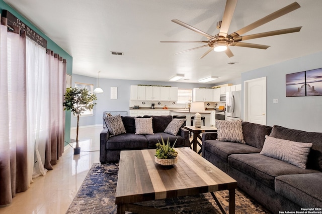 living room with ceiling fan