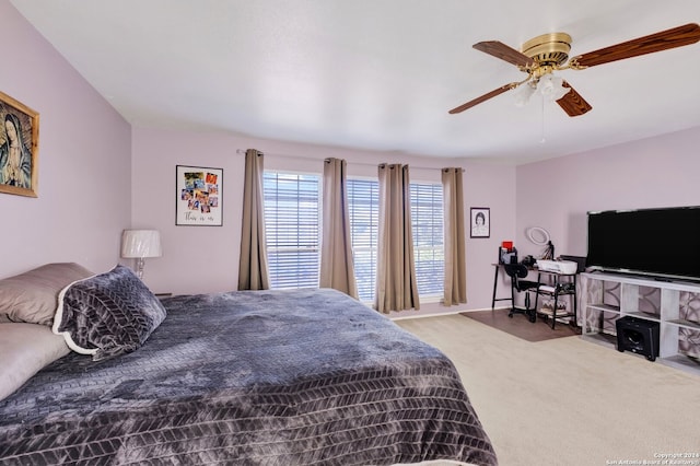 carpeted bedroom with ceiling fan