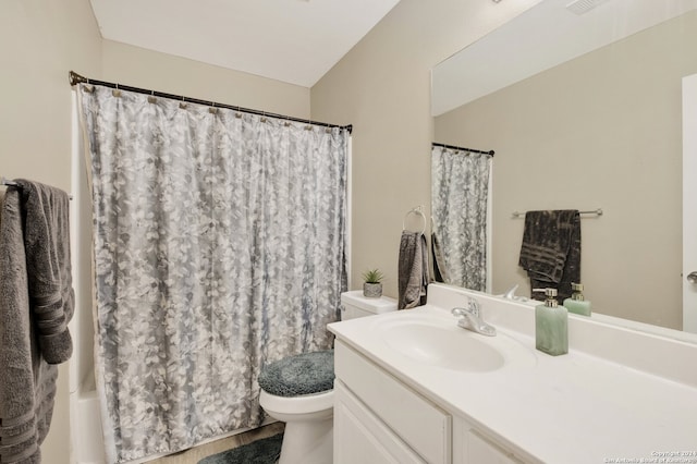 full bathroom featuring toilet, vanity, and shower / bath combination with curtain