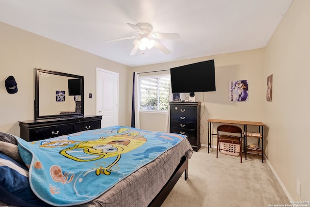 bedroom with light carpet and ceiling fan