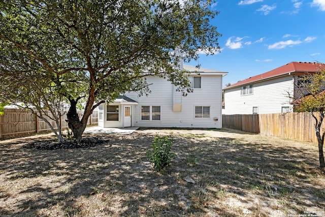 back of house featuring a patio