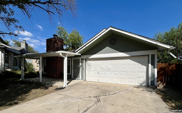 single story home with a garage